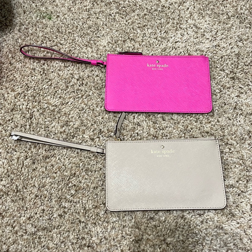 Kate spade pink and tan wristlets